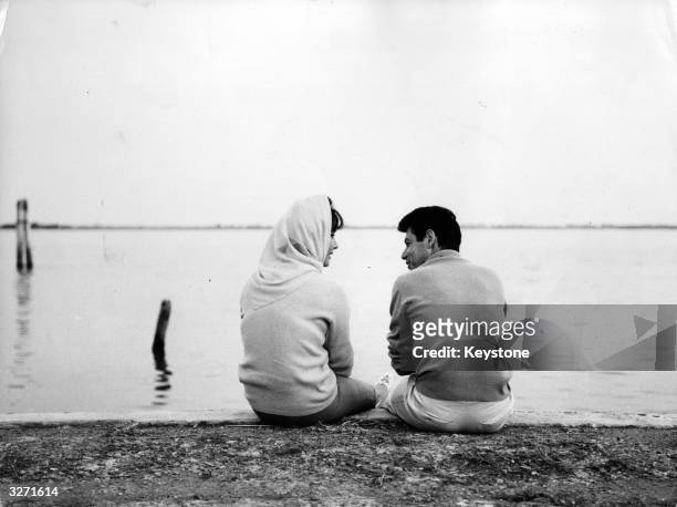 Film star Elizabeth Taylor and her husband, singer Eddie Fisher, on holiday on Burano Island in the lagoon at Venice.