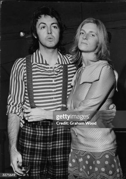 Singer, songwriter and bass player Paul McCartney with his wife, photographer Linda McCartney who are both in Paul's group Wings.