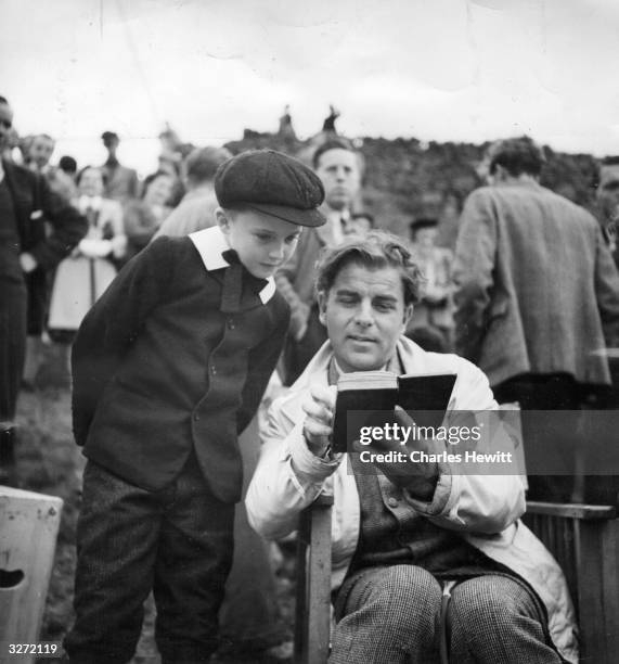 Emlyn Williams , directs and stars in the film ' The Last Days Of Dolwyn', about a disaster for a village in Wales in the 19th century when it is...