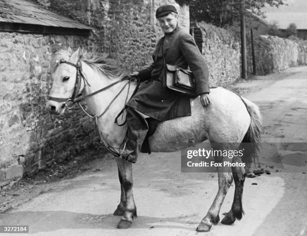 Welsh schoolboy who rides 14 miles daily on his mountain pony over the Breamock Beacons to his school at Bream Tarn.