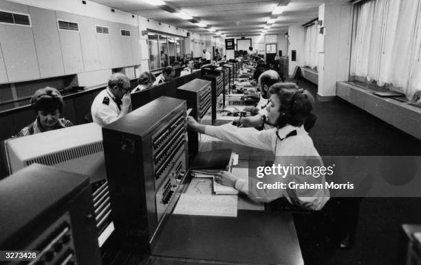 The main switchboard and data link at the Information Room of New Scotland Yard.