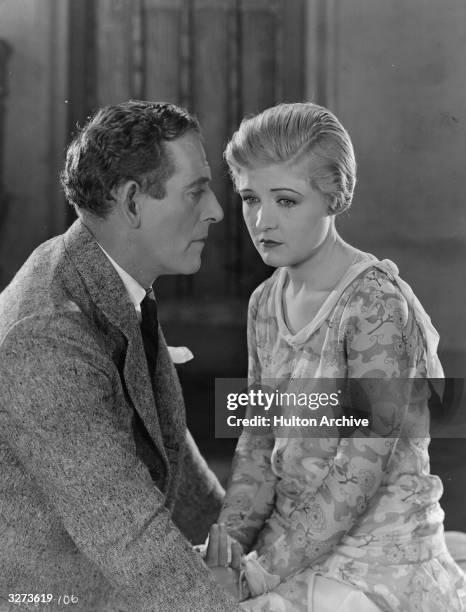 American actress Laura La Plante shares an intense moment with a co-star in the film 'Butterflies in the Rain', directed by Edward Sloman for...