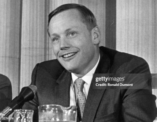 Neil Armstrong, American Lunar Astronaut giving a press interview.