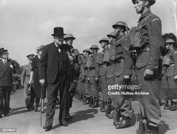 Sir Winston Leonard Spencer Churchill inspecting the Home Guard Civil Defence Services in Hyde Park, London.
