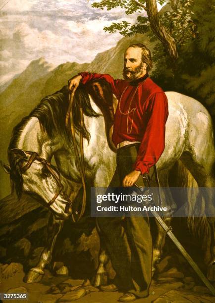 Giuseppe Garibaldi the patriot, beside his horse.