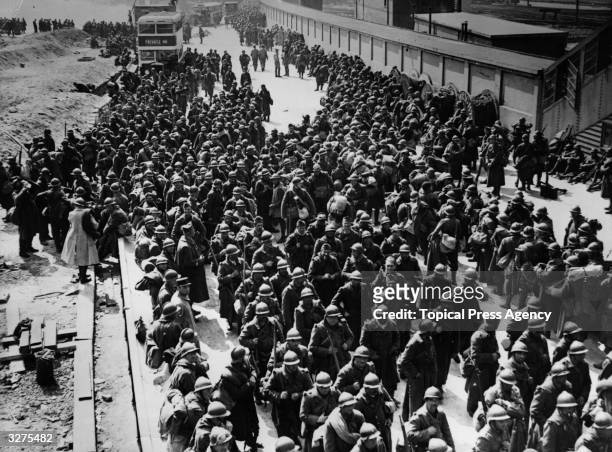 French marines and soldiers who have been fighting the rear guard action arrive at a South Coast town having been evacuated from Dunkirk.
