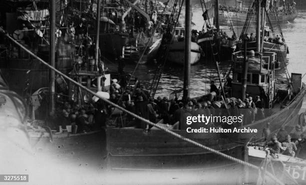 Flotilla of small boats, some carrying French troops, taking part in the Dunkirk evacuation, 26th May - 4th June 1940.