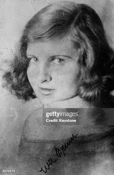 Eva Braun , Adolf Hitler's mistress whom he married the day before their suicide in Berlin. Hitler always carried this signed picture in his wallet,...