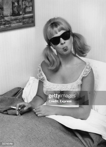 Model and show girl Mandy Rice-Davies, who rose to fame for her part in the 'Profumo Affair', the trial of British cabinet minister John Profumo.