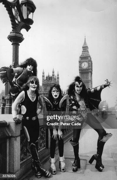 American theatrical glam rock group Kiss pose on Westminster Bridge in London at the start of their first ever European tour. The band members are,...