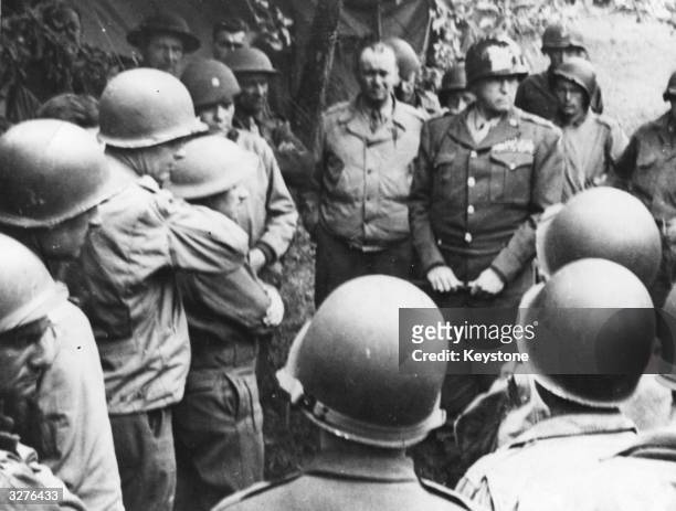 Major General George Smith Patton 'Old Blood & Guts' meeting the War Correspondents attached to the Third Army after arriving in France.