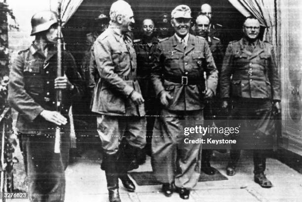 Field Marshal Kesselring, Commander-in-Chief of German troops in Italy, visits General Graziani, Minister of War for Mussolini's 'Puppet' government,...