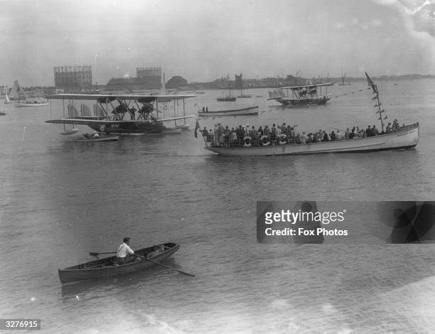 Two RAF Supermarine Southampton flying boats moored offshore at Southend amid pleasure boats and rowing boats.