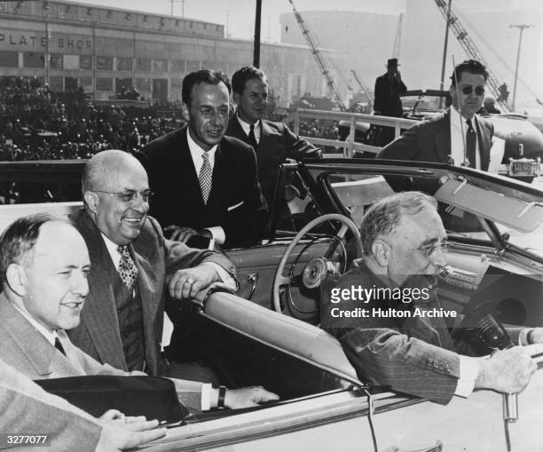 President Roosevelt stops at a West Coast shipyard during an 8,000-mile tour of the United States visiting industries and the armed forces. In the...
