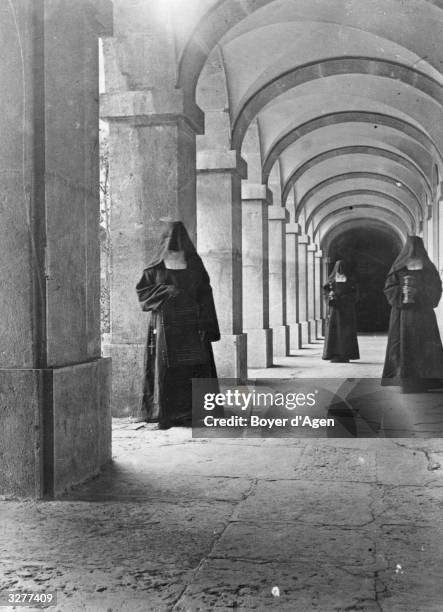 Carmelite nuns in the cloisters of their nunnery.