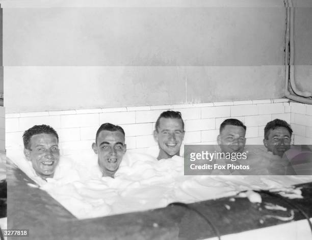 Some of the Fulham team take a well earned bath at Craven Cottage.