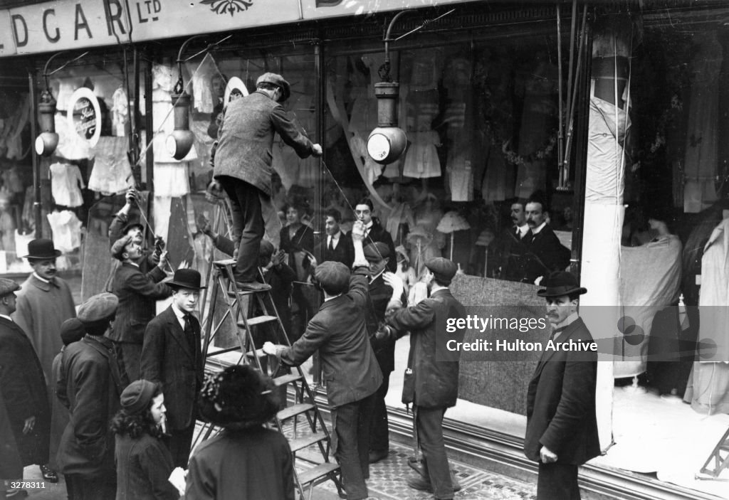 Window Slap A clearing up operation after window-smashing by suffragettes. News ...