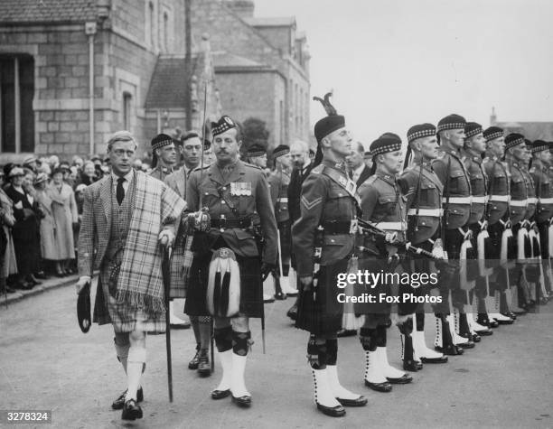 King Edward VIII inspects a Scottish regiment at Balmoral. Queen Victoria's husband, Prince Albert, purchased Balmoral Castle in 1846, and the small...