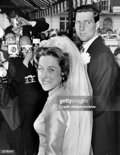 The Queen's cousin, Elizabeth Abel Smith marries shipping executive Peter Wise in Knightsbridge.