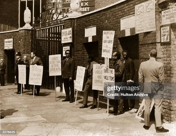 Group of anti-apartheid protesters at the Oval Cricket Ground in London.