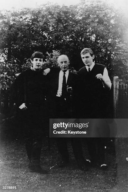 Paul McCartney with his father and brother Mike.