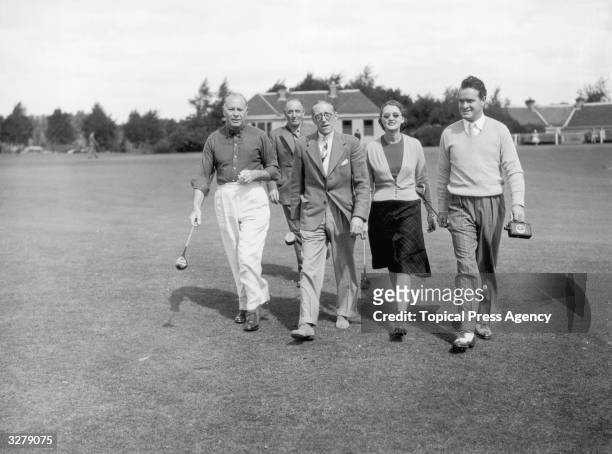English-born American comedian and film star Bob Hope playing on the King's course at Gleneagles Hotel. The Hotel has four golf courses including the...