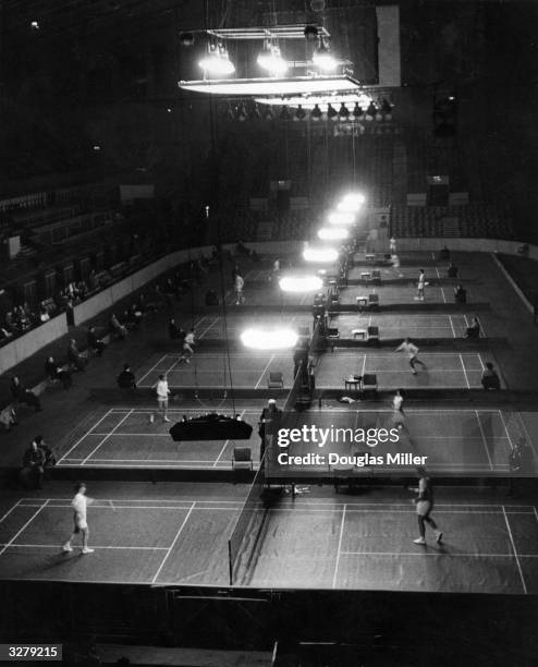 The start of the All-England Badminton Championships, being held at Wembley.