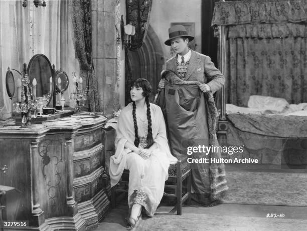 Actors Edmund Lowe and Renee Ado in a scene from the film 'Soul Mates'.