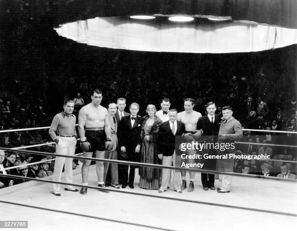 Line up of certain boxing celebrities and the cast during the MGM production of 'The Prizefighter And The Lady'. From left to right: Bill Duffy,...