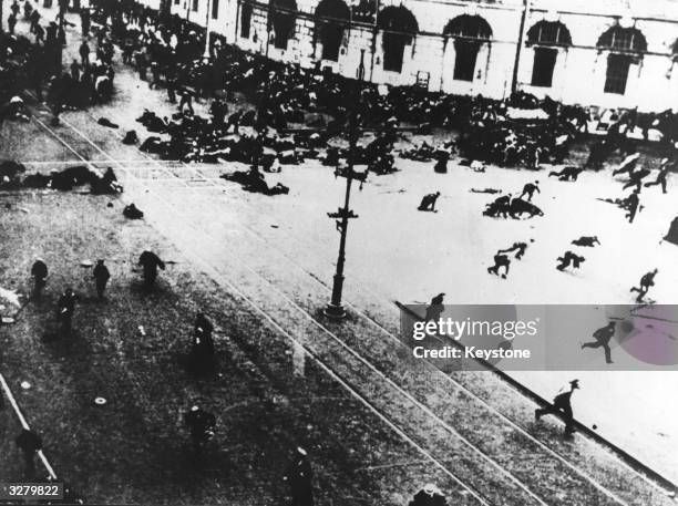 Fleeing crowds during the Russian Revolution which resulted in the seizing of power by the Bolsheviks under Lenin.