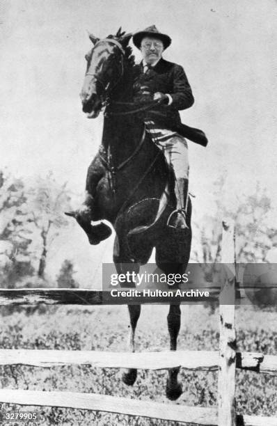 Theodore Roosevelt , the 26th President of the United States , jumping hurdles at the Chevy Chase club Washington.