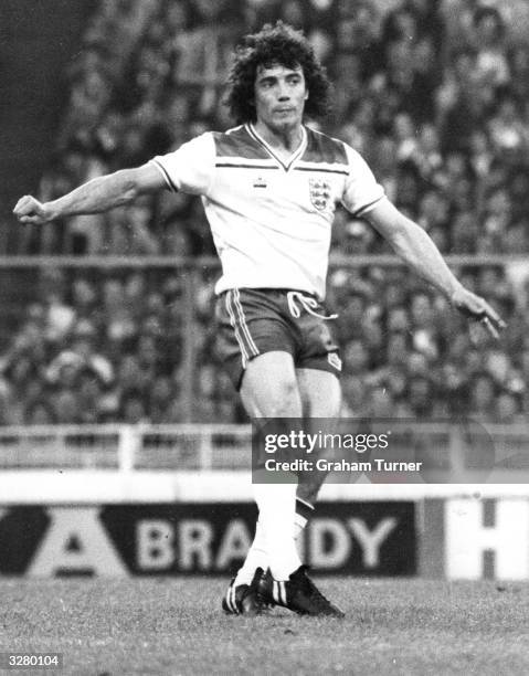 Kevin Keegan, captain of the England Football team, warms up before the kick off of an international match at Wembley Stadium.