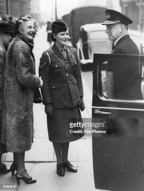 Wife of the Premier, Mrs Churchill, and her daughter Mary, with the First Sea Lord, Sir Dudley Pound . Mary was a Lance Corporal in the ATS.