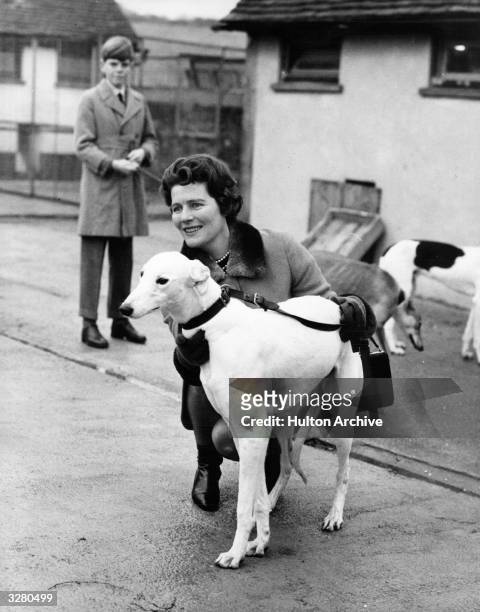 Mary Churchill, with one of Sarah's dogs, which appears to be a greyhound.