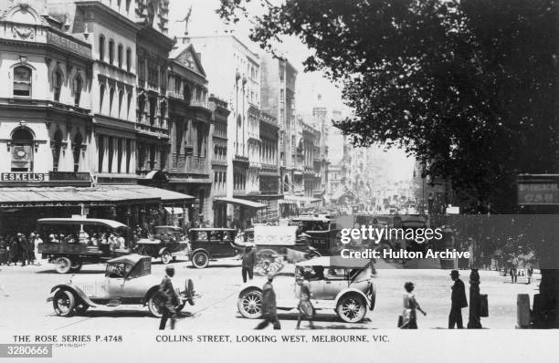 View of the busy traffic on Collins Street, Melbourne, Victoria in Australia.