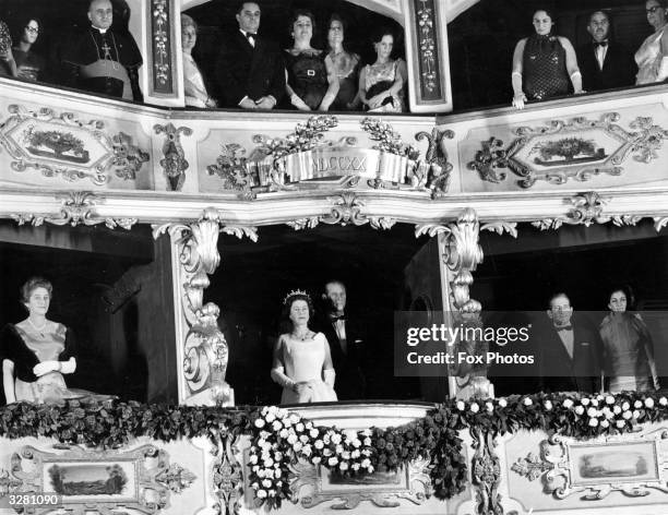 The Queen and Prince Philip at the Theatre during their Malta visit. In the box on the left is Lady Dorman the wife of the Governor-General and on...