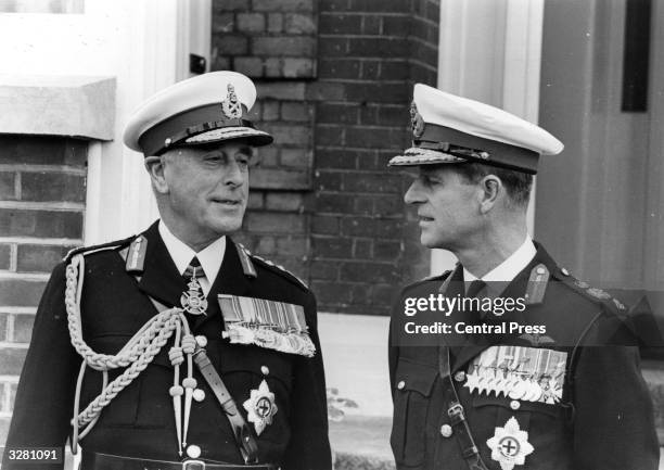 Earl Mountbatten of Burma with his nephew, Prince Philip, Duke of Edinburgh, 1st October 1965. They are both in the uniform of the Royal Marines.