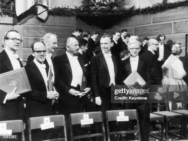 James Watson and Francis Crick are amongst the winners receiving their Nobel Prizes in Stockholm Professor Maurice Williams; Dr Max Perutz ; Dr...