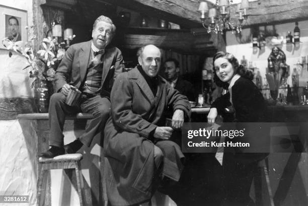 Alastair Sim , Edward Rigby and Patricia Roc watch the other actors rehearse a scene for the film 'Let The People Sing'. Title: Let The People Sing...