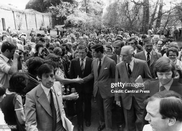 Prince Charles, Prince of Wales with Lord Louis Mountbatten in the grounds of Broadlands, the Mountbattens' home in Hampshire soon after it was...