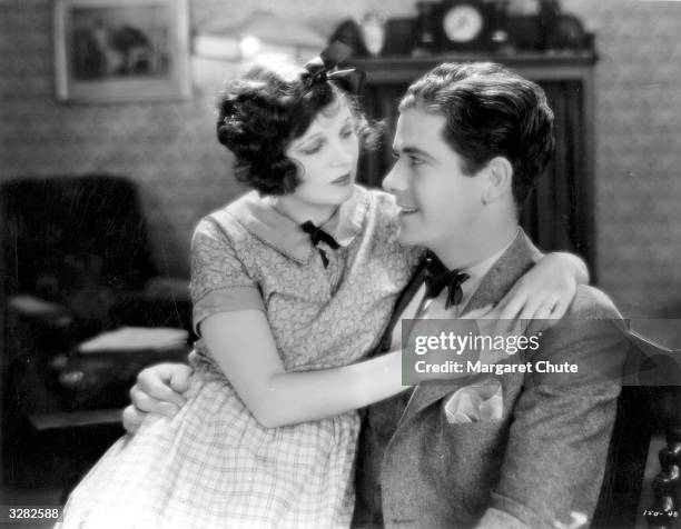 Grant Withers , the American general purpose actor and Corinne Griffith the American leading lady are in loving mood in a scene from 'Saturday's...