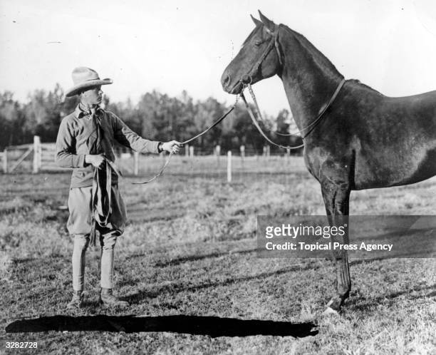 The Duke of Windsor, , as Edward, Prince of Wales, on his ranch during a royal tour with the famous horse 'Will Somers'. He reigned as King Edward...