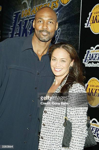 Karl Malone of the Los Angeles Lakers and wife Kay arrive for the 1st Annual Palms Casino Royale to benefit the Los Angeles Lakers Youth Foundation...