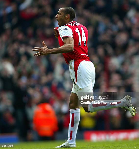 Thierry Henry of Arsenal celebrates scoring the third goal for Arsenal during the FA Barclaycard Premiership match between Arsenal and Liverpool at...