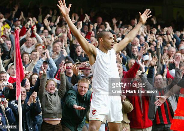 Thierry Henry of Arsenal celebrates scoring his hat-trick and Arsenal's fourth goal during the FA Barclaycard Premiership match between Arsenal and...