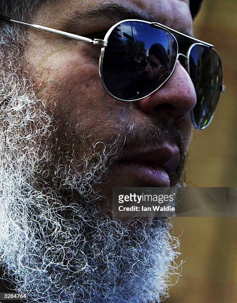 Radical Muslim cleric Abu Hamza leads worshipers at Finsbury Park Mosque as members of the extreme right-wing group, the National Front hold a...