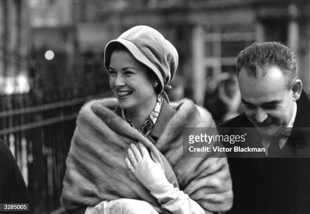 Princess Grace and Prince Rainier of Monaco shopping in London's West End.