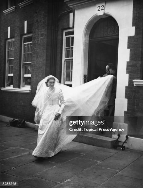 Marion Stein seen leaving her home to be married at St Mark's Church London to the 7th Earl of Harewood.