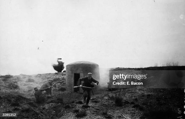 German pillbox under fire from a British tank in a scene from a British film shot in Dorset, England.