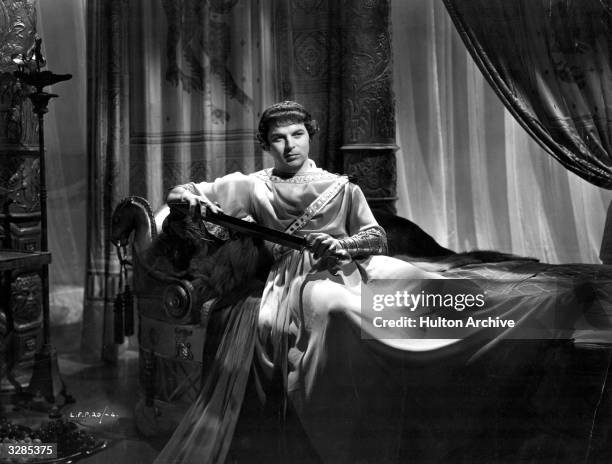 Emlyn Williams , the Welsh actor and playwright as the cruel Caligula in a scene from the film 'I, Claudius', directed by Josef Von Sternberg and...